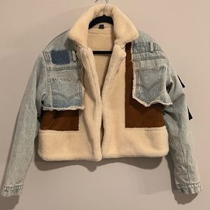 Multi fabric jacket. Size Large.